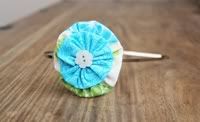 Blue and Green Yo Yo Flower Metal Headband will fit a toddler, child, teen or Adult woman [see more
